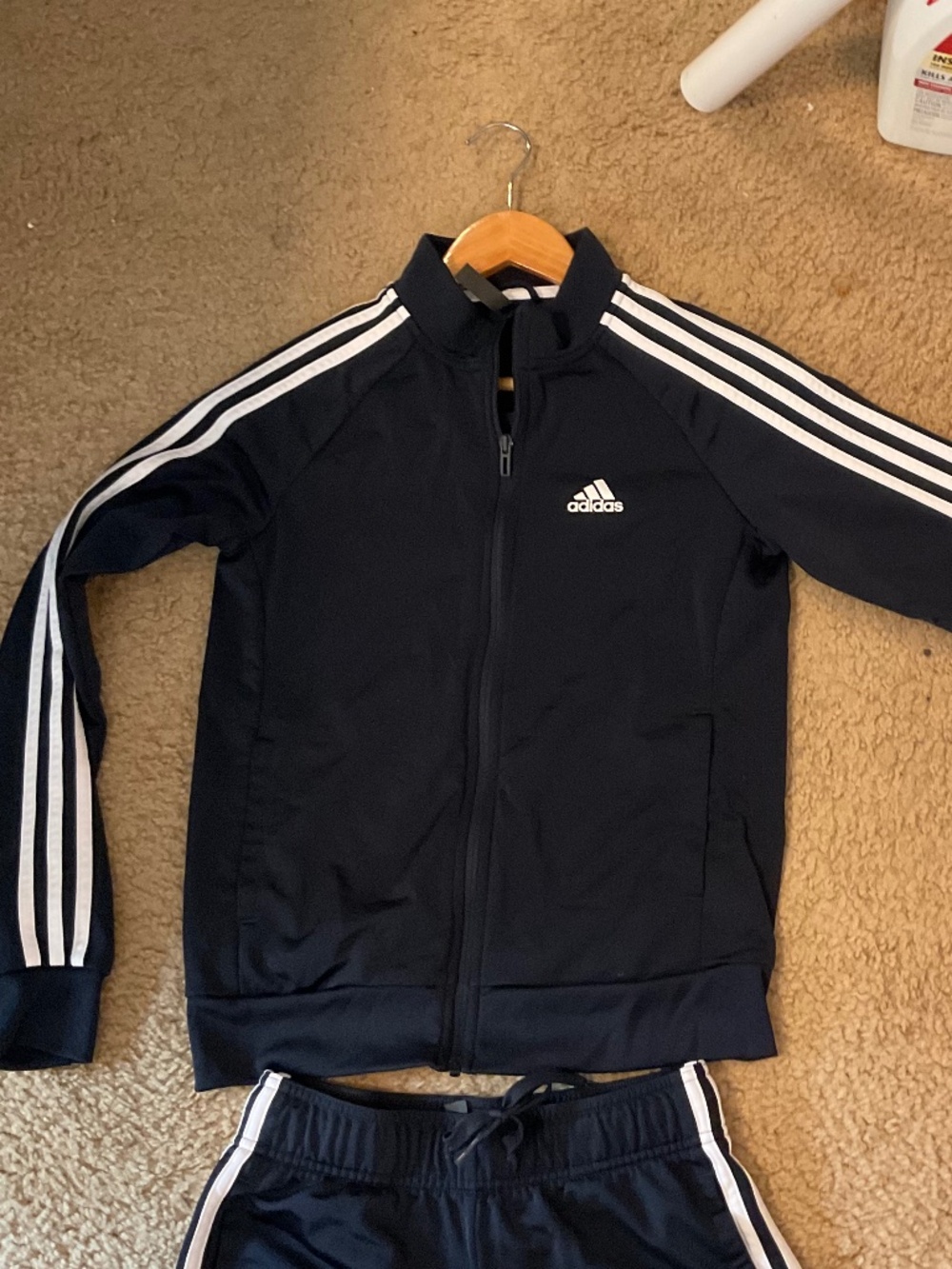 Adidas track suit in dark blue
